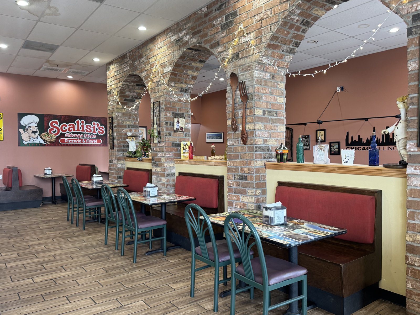 Brick arches and red booths inside Scalisi's dining room
